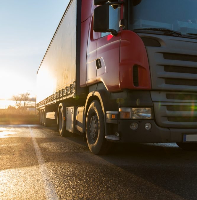 close up of truck on parking transportation, freight transport and vehicle concept - close up of truck on parking